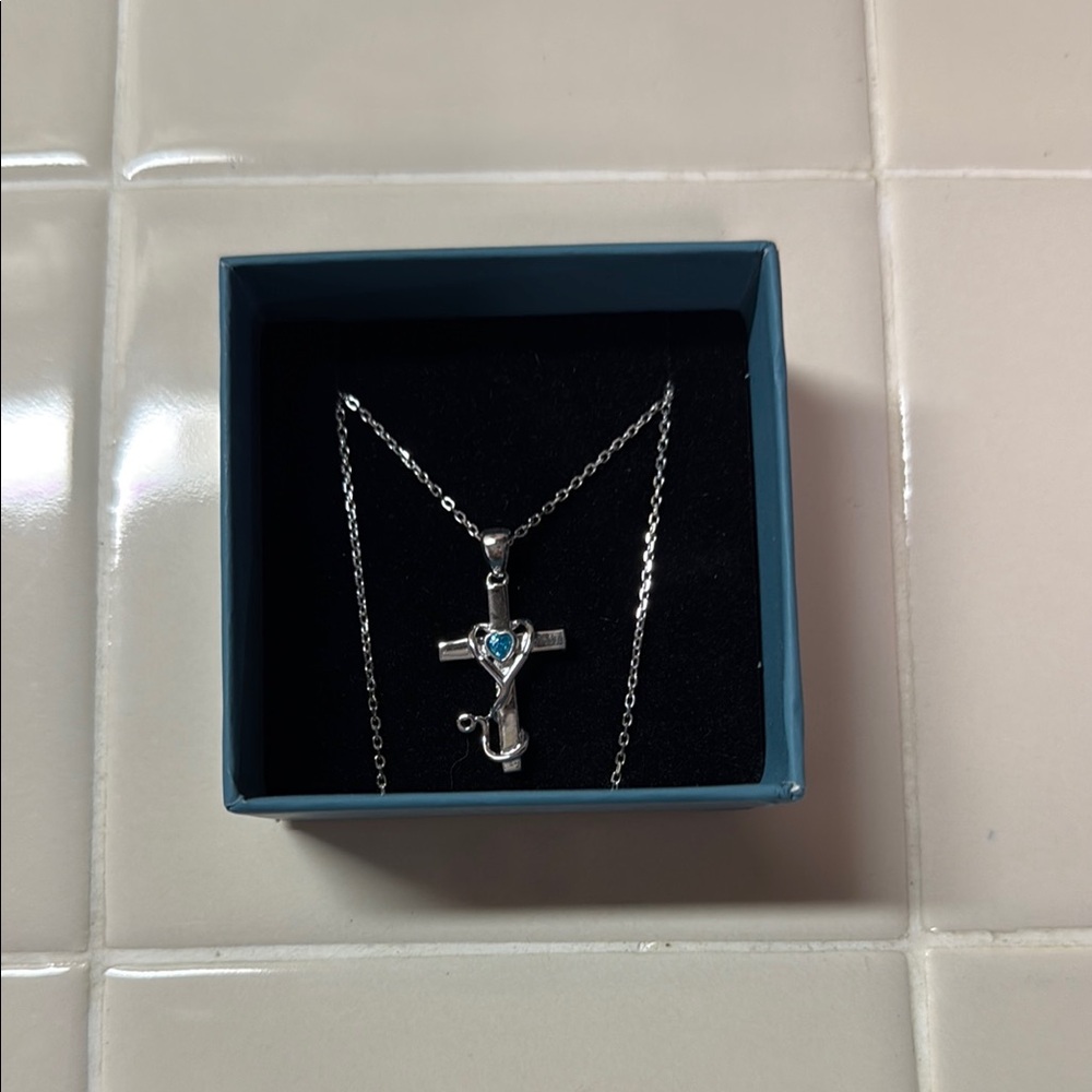 Silver and Blue Cross Pendant Necklace